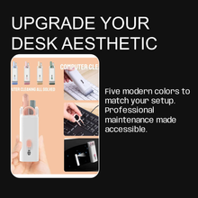 	7-in-1 cleaning kit contents laid out — brush, spray, pen, puller