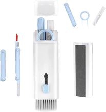 Microfiber cloth and spray bottle cleaning laptop screen