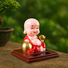 Solar Power Moving Head Buddha Statue Car Ornament (1 Pc  Mix Color)